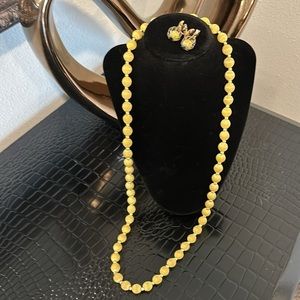 Vintage pale yellow silk wrapped and small gold colored beaded necklace